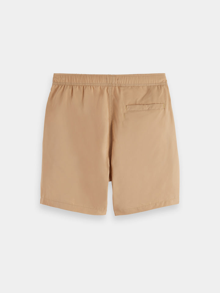 Scotch & Soda Solid Mid-Length Swim Short in Soft Camel | Buster McGee