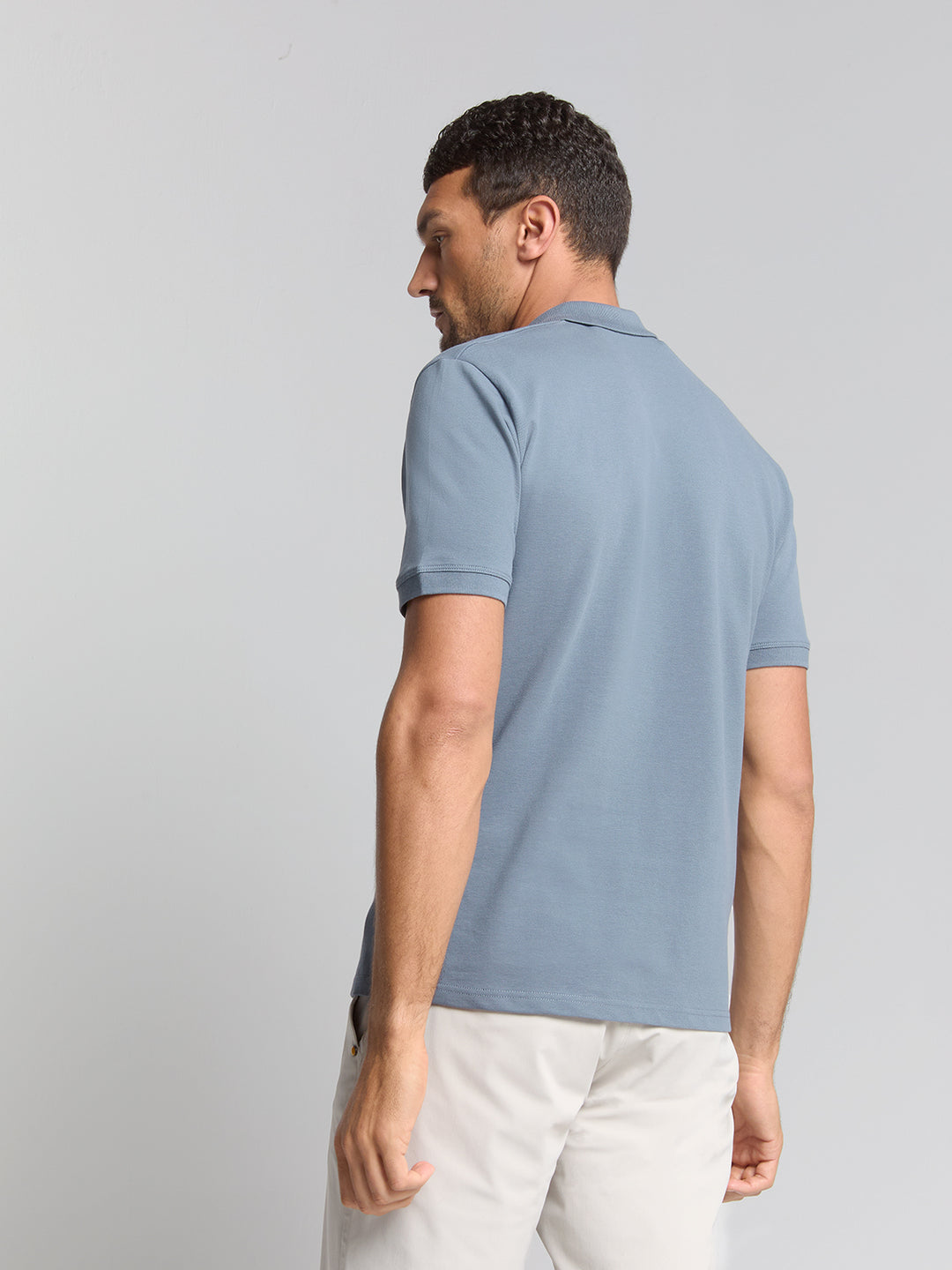 No Excess Solid Stretch Pique Polo in Washed Blue | Buster McGee