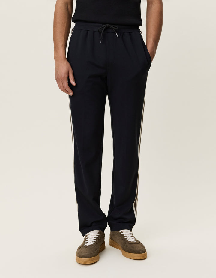 Les Deux Signature Rib Tape Track Pants in Black | Buster McGee
