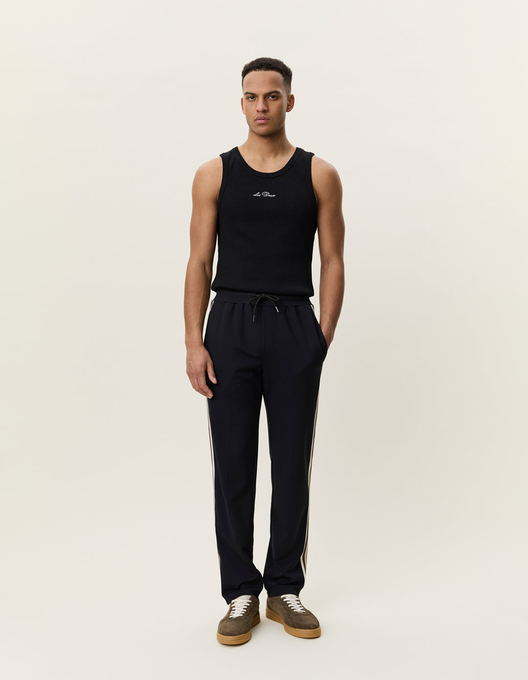 Les Deux Signature Rib Tape Track Pants in Black | Buster McGee