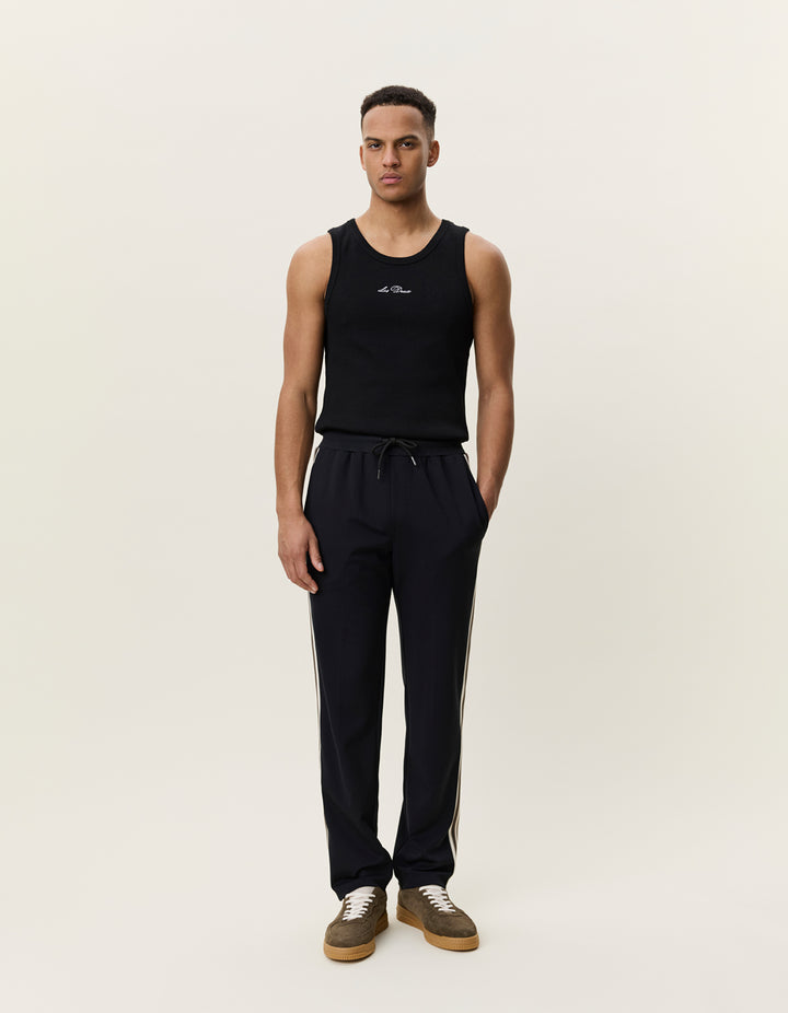 Les Deux Signature Rib Tape Track Pants in Black | Buster McGee