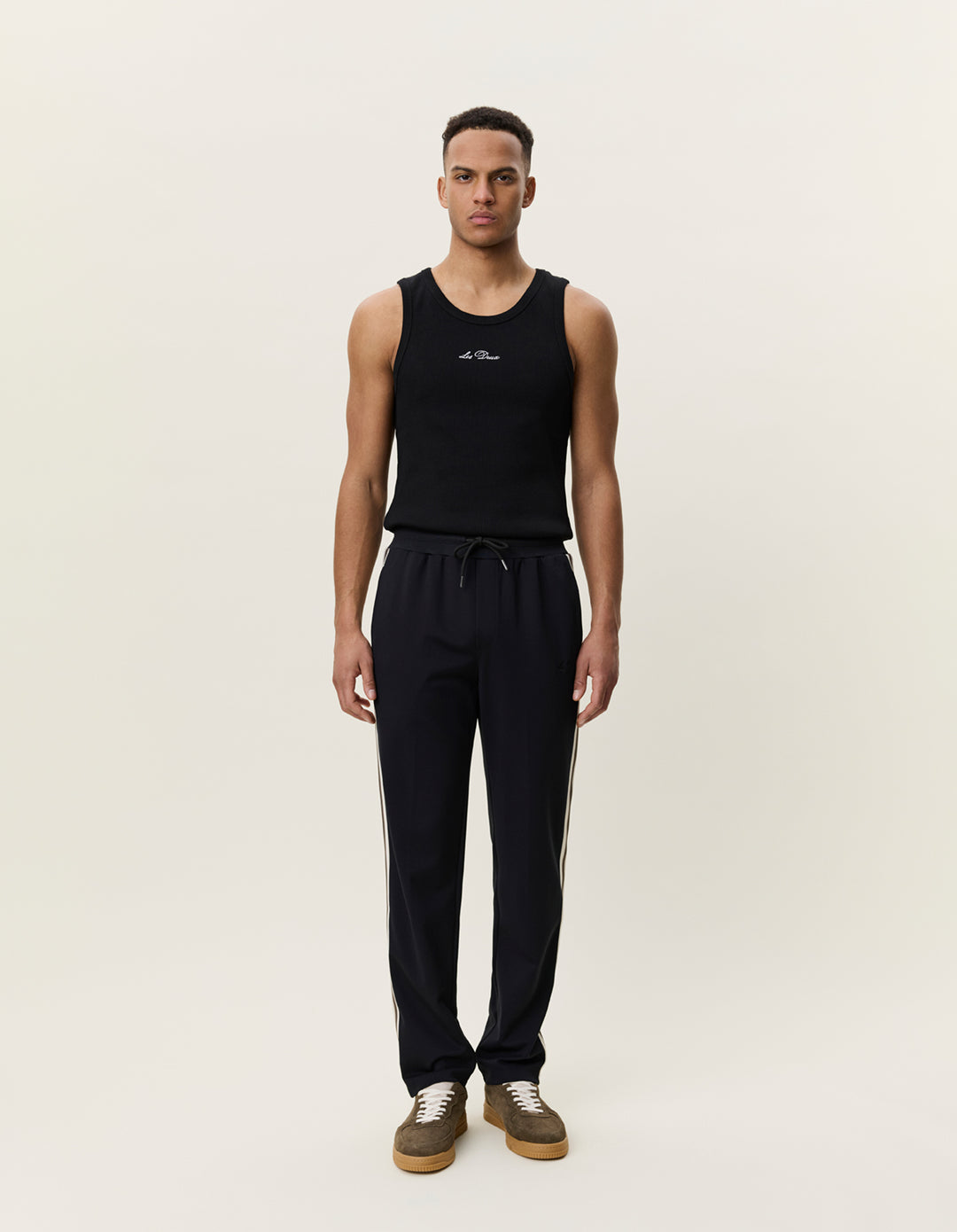 Les Deux Signature Rib Tape Track Pants in Black | Buster McGee