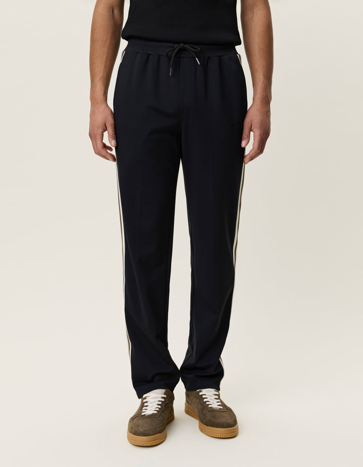 Les Deux Signature Rib Tape Track Pants in Black | Buster McGee