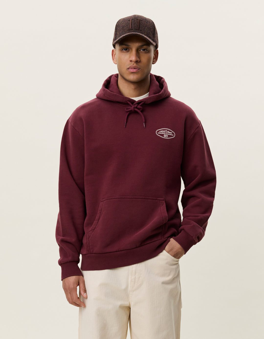 Les Deux Worldwide Hoodie in Chocolate Truffle Red | Buster McGee