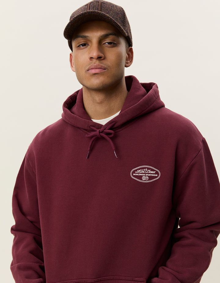 Les Deux Worldwide Hoodie in Chocolate Truffle Red | Buster McGee