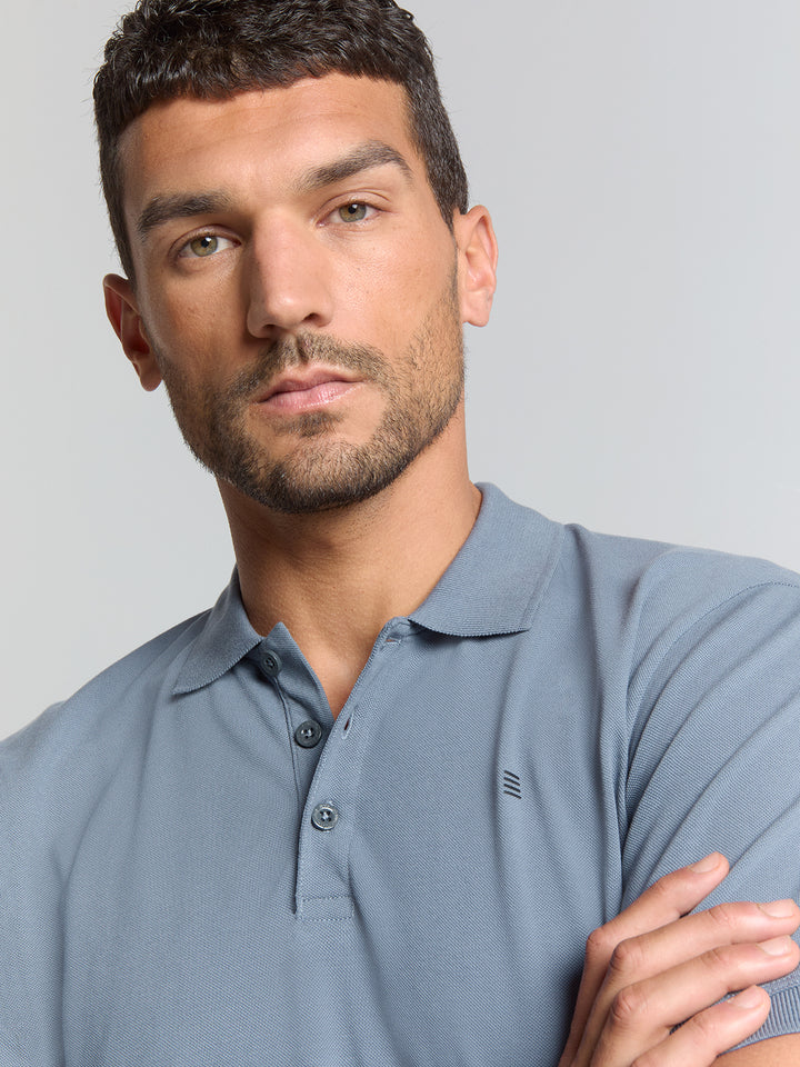 No Excess Solid Stretch Pique Polo in Washed Blue | Buster McGee