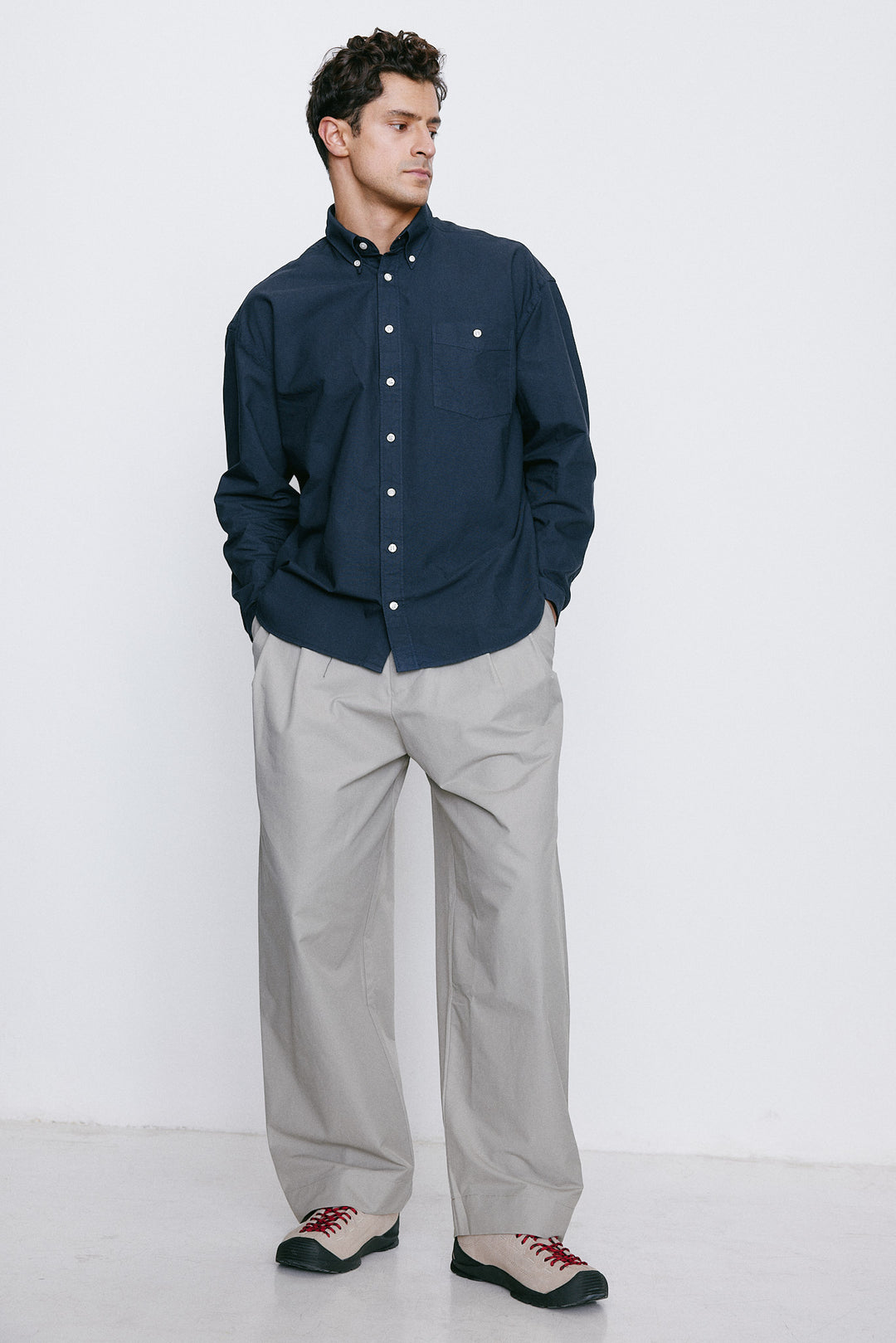 Unfeigned Long Sleeve Washed Oxford Shirt in Navy Blue | Buster McGee