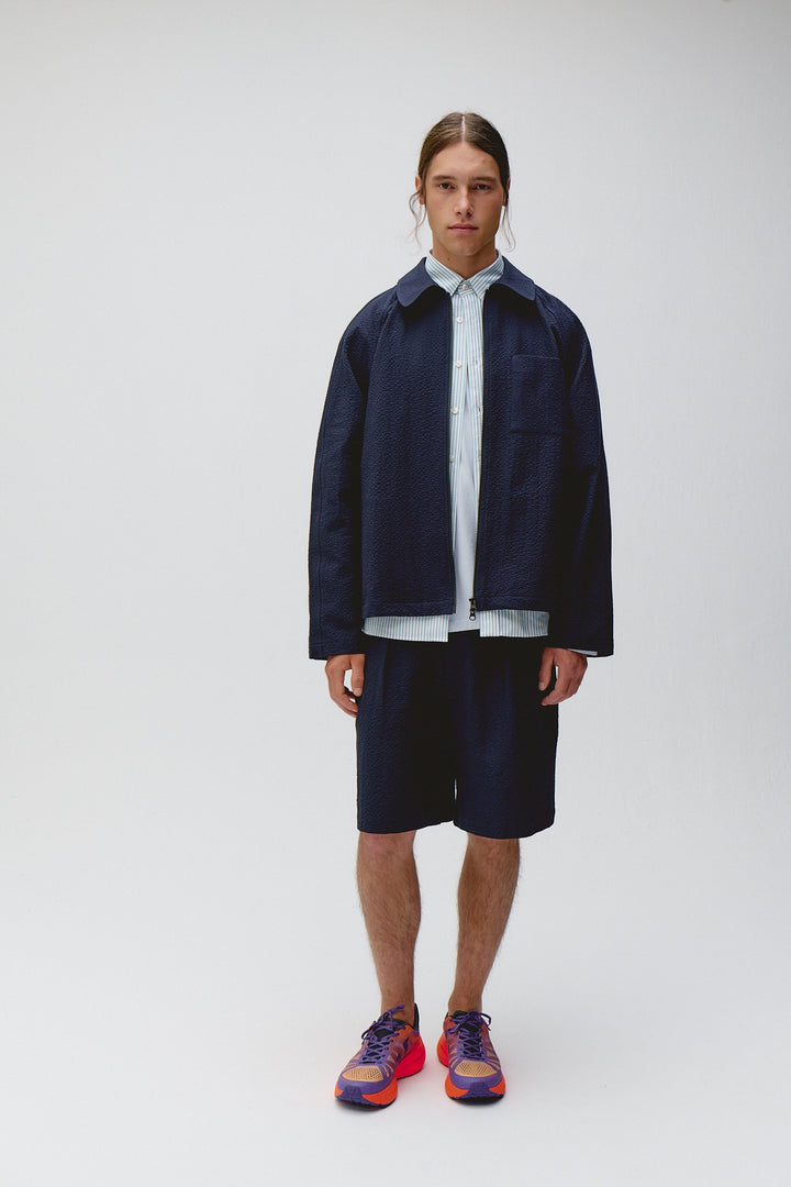 Unfeigned Our Coach Jacket in Dark Navy Seersucker | Buster McGee