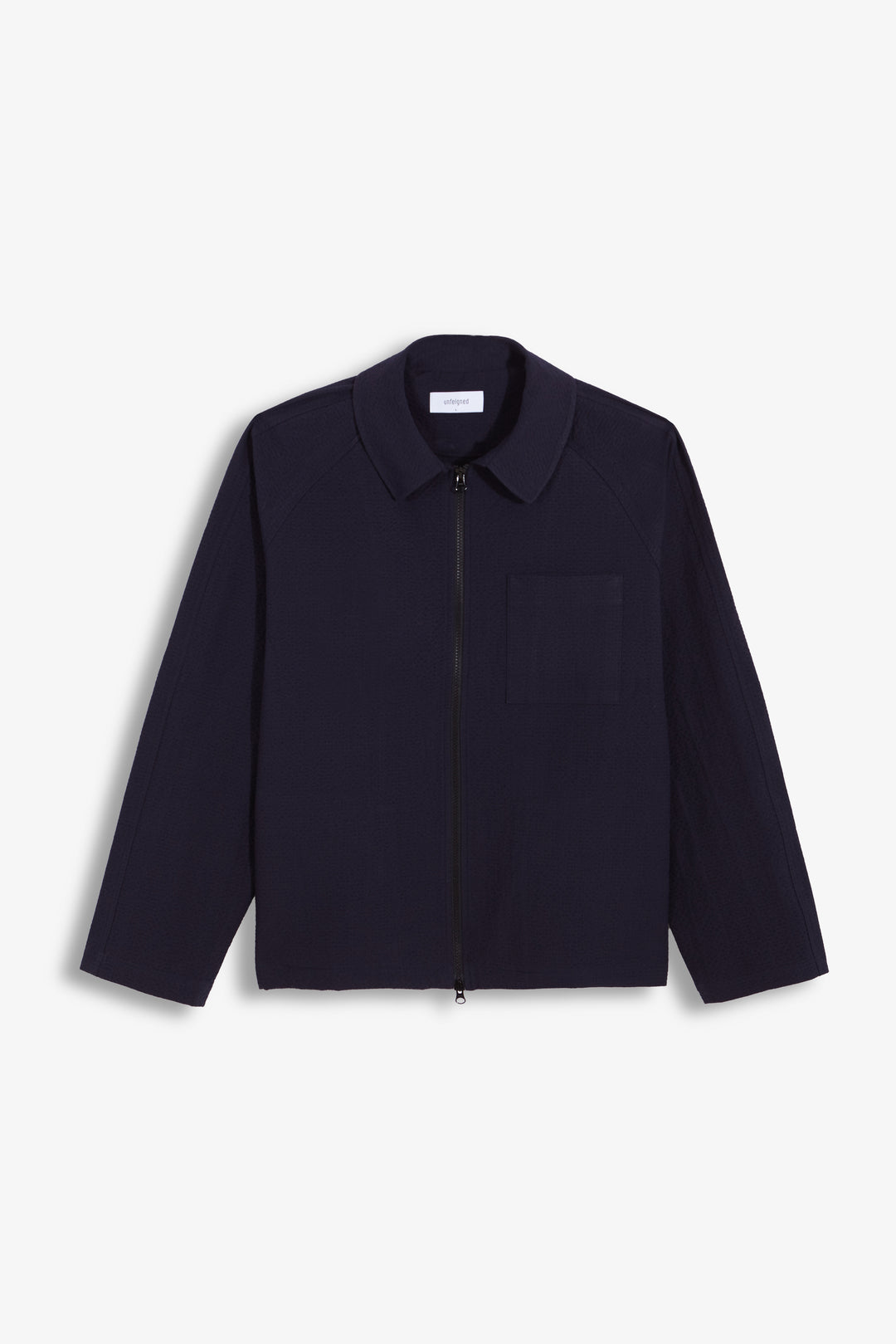 Unfeigned Our Coach Jacket in Dark Navy Seersucker | Buster McGee
